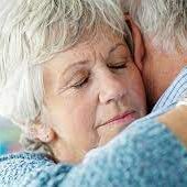 older woman hugs older man